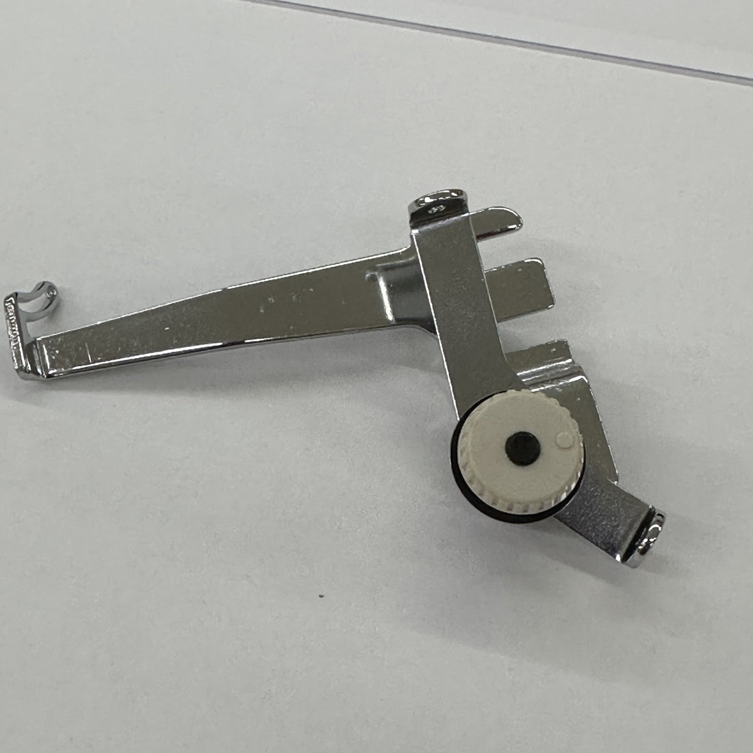 JUKI 13326350 Upper Looper Tension Assembly, photo 1 of 7