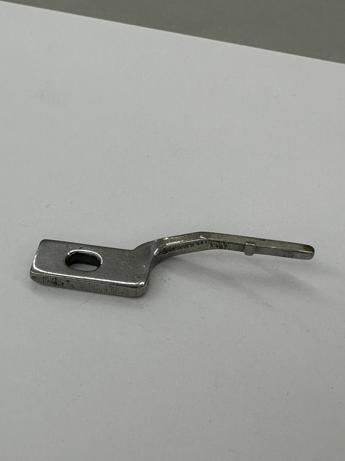 JUKI 22916407 Bobbin Case Positioning Finger, photo 1 of 6