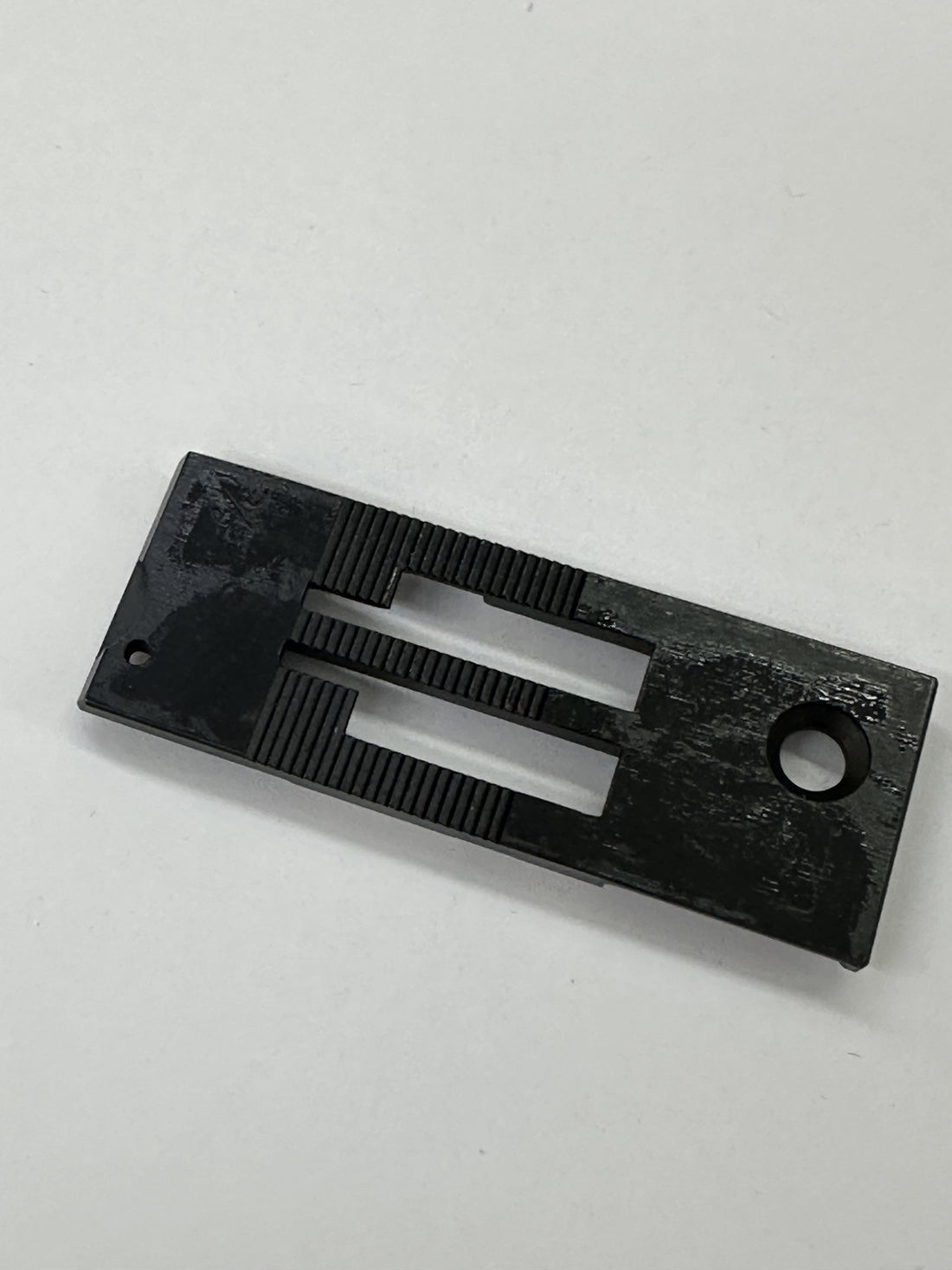JUKI 40025495 Throat Plate Trim 3/8, photo 1 of 7
